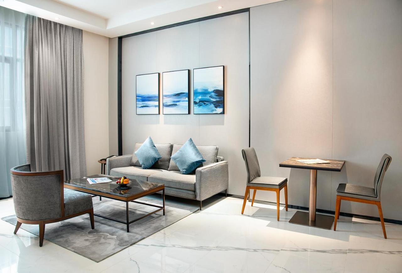 Asiana Grand Hotel Dubai Exterior photo A living room at the hotel