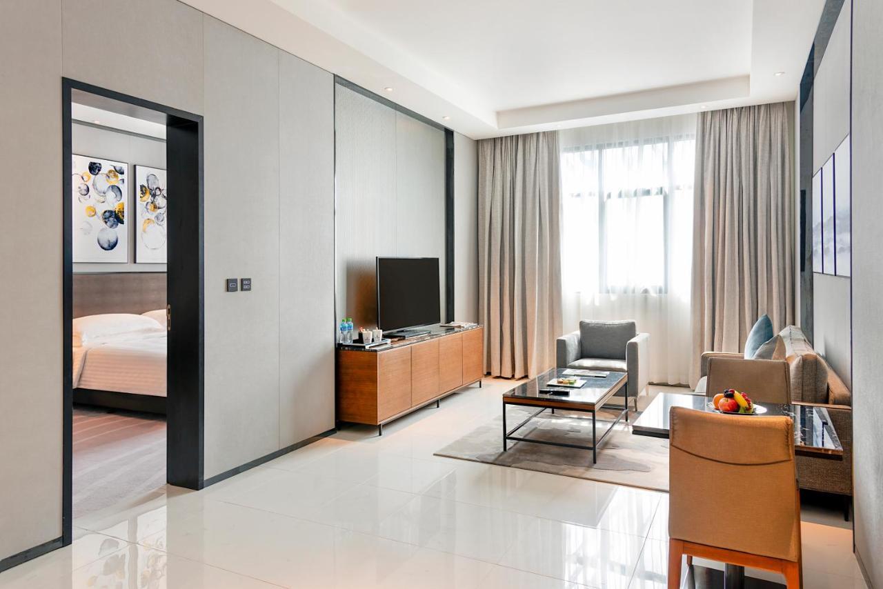 Asiana Grand Hotel Dubai Exterior photo A suite at the hotel
