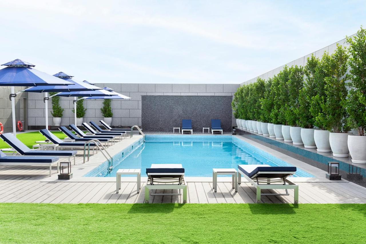 Asiana Grand Hotel Dubai Exterior photo The swimming pool at the hotel