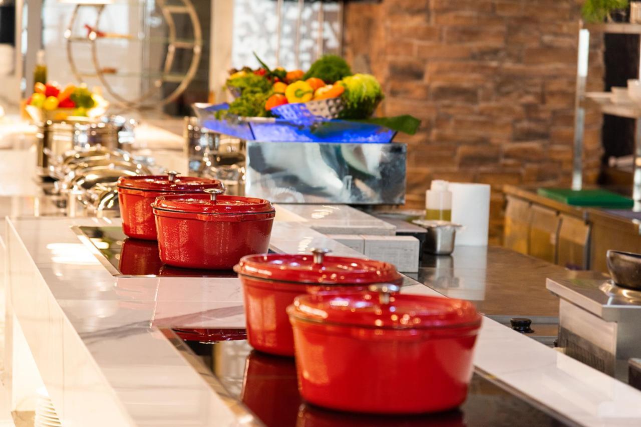 Asiana Grand Hotel Dubai Exterior photo Le Creuset cast iron cookware