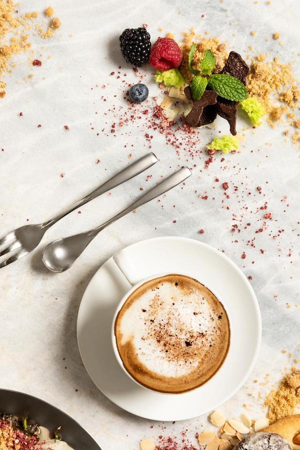 Asiana Grand Hotel Dubai Exterior photo A cup of coffee